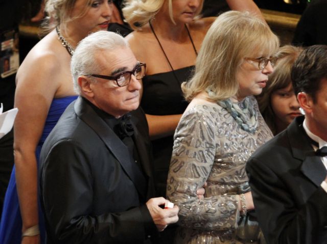 Director Scorcese and his wife Morris arrive for the 84th Academy Awards in Hollywood