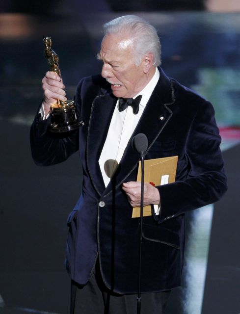 Plummer, accepts the Oscar for best supporting actor for his role in "Beginners" at the 84th Academy Awards in Hollywood